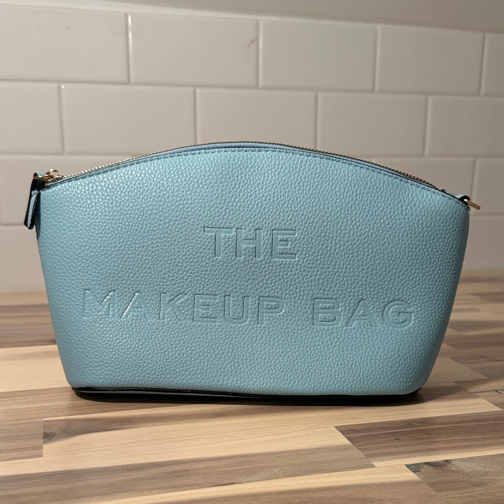NWOT Light Blue Cosmetic Pouch with detachable strap